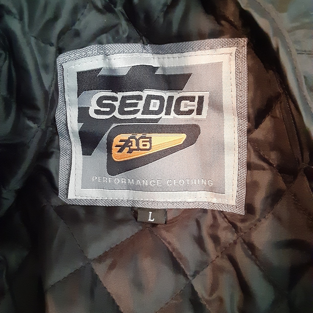 2 Men and Ladies motorcycle riding jackets.